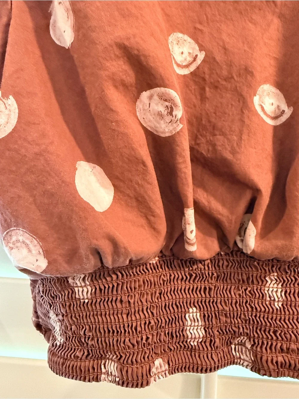 Anthropologie rust brown cropped blouse with white dot print